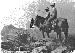 A 1910 photo with Texas Rangers' surveying